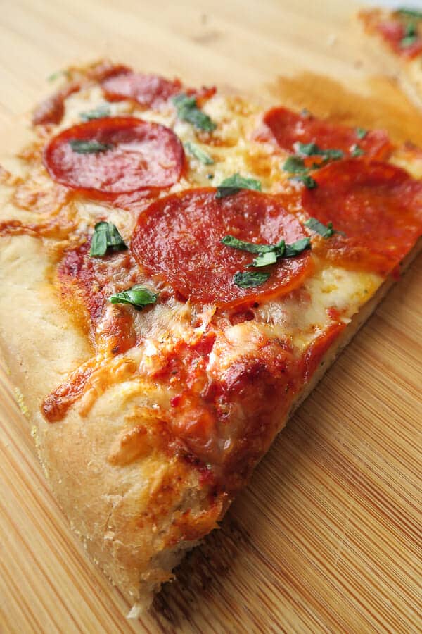 pepperoni thin crust pizza slice