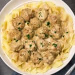 easy Swedish Meatballs served over egg noodles