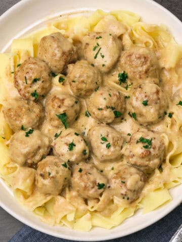 easy Swedish Meatballs made with frozen meatballs served over egg noodles